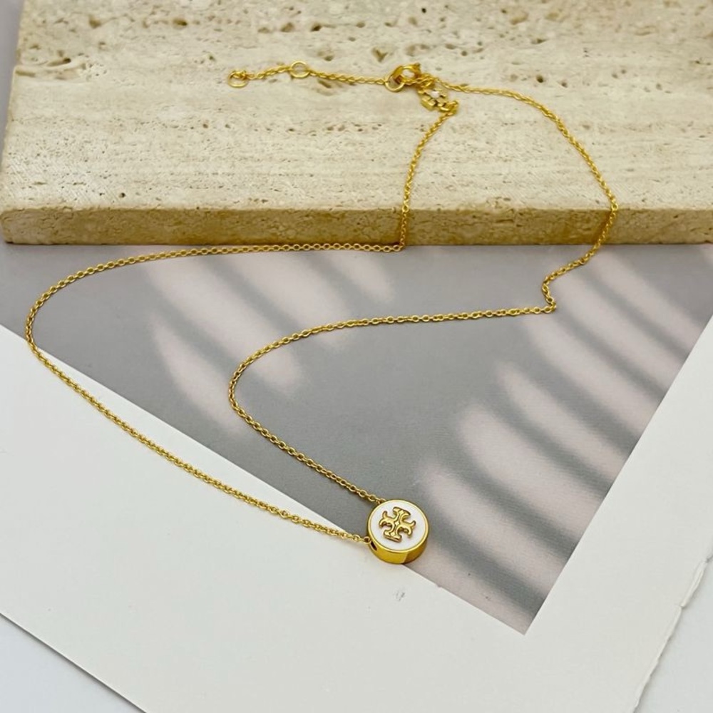 Tory Burch jewelry Elegant Gold Pendant Necklace